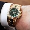 ROLEX PERPETUAL SUPERLATIVE CHRONOMETER OFFICIALLY CERTIFIED COSMOGRAPH DAYTONA WATCH GREEN WITH STAINLESS STEEL GOLD BELT