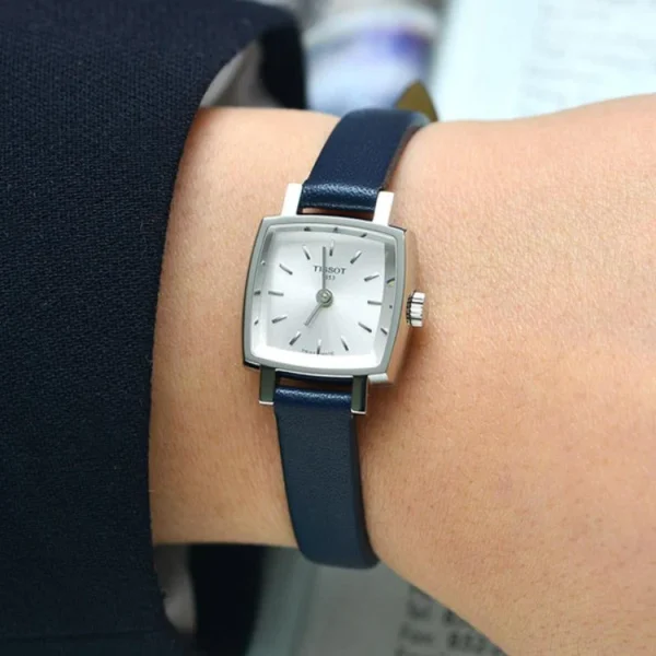 bd4a6d12b9c1b75cf75bcc9bc329a0e7 Tissot Lovely Square Silver Dial Blue Leather Strap Watch For Women - T058.109.16.031.00