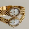 Tory Burch Oval Mother of Pearl Dial Gold Steel Strap Watch for Women - TBW6034