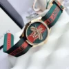 Gucci Le Marche des Merveilles Green & Red Dial Green & Red NATO Strap Unisex Watch - YA126487