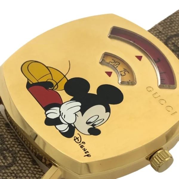 2173462633_630994fe-f34c-4779-b1a9-0a199fda6d43 Gucci Grip Disney Mickey Mouse Gold Dial Brown Leather Strap Watch For Women - YA157420