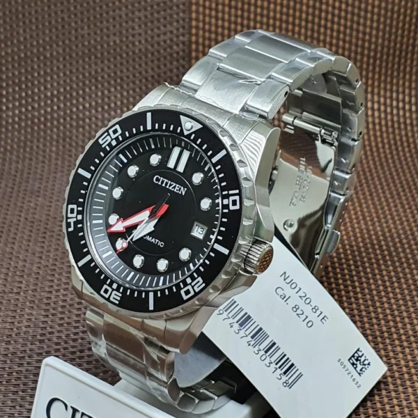 4a5deadb20200ccdf3c85a8f7d0dcd84-374112_33568b0e-c53c-4ce6-af73-aeefb06f5b3f Citizen Mechanical Black Dial Silver Steel Strap Watch For Men - NJ0120-81E