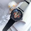 4bd42540fc59805dd2b77a1456155e73_66af84a8-315b-4da4-8937-78b911ad227f-230065 Gucci G Timeless Cat Motif Black Dial Black Leather Strap Unisex Watch - YA1264021