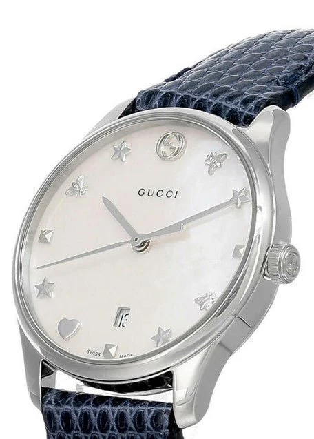 Screenshot_1-102-770303 Gucci G-Timeless Signature Mother of Pearl Star Dial Blue Watch For Women - YA126588