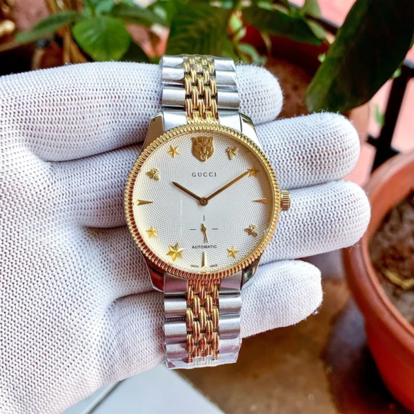 WhatsApp-Image-2023-12-07-at-12.51.18_1ceabfb6-0557-445d-b647-f074e0e39b7c Gucci G Timeless Automatic White Dial Two Tone Steel Strap Watch for Men - YA126356