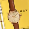 a203-226632_454af919-132f-472f-a07f-843e0e794920 Burberry The Classic Champagne Gold Dial Brown Leather Strap Watch for Women - BU10101