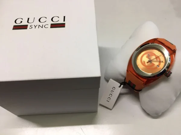 ch_images_t_1000x750_2d8ad555-55c3-45ef-a152-4194154bc251 Gucci Sync XXL Quartz Orange Dial Orange Rubber Strap Unisex Watch - YA137108