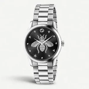 com_is_image_selfridges_e78ac5a9-bb6e-403c-a9c4-730600122516 Gucci G Timeless Quartz Black Dial Silver Steel Strap Watch For Women - YA1264136