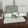 com_original_1edde1_713b0014-89c4-4ebf-81d3-85bfb18cf578 Calvin Klein Accent Silver Dial White Leather Strap Watch for Women - K2Y2Y1KW