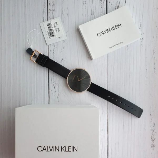 com_v1_files_u8rqqizzqk422-UA_175341e9-fd00-4452-bf81-f0867261e2d9 Calvin Klein Full Moon Black Dial Black Leather Strap Watch for Women - K8Y236C1