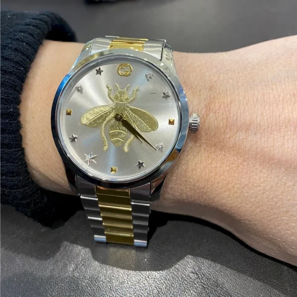 dda0ef59-aa8a-479e-9448-956948debe36-630162 Gucci G Timeless Silver Dial Two Tone Steel Strap Watch For Women - YA1264131