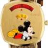 gucci-disney-x-grip-watch-35mm1_9cfc6f8a-dbd3-42e5-ada7-8b76ec3b5d7b Gucci Grip Disney Mickey Mouse Gold Dial Brown Leather Strap Watch For Women - YA157420