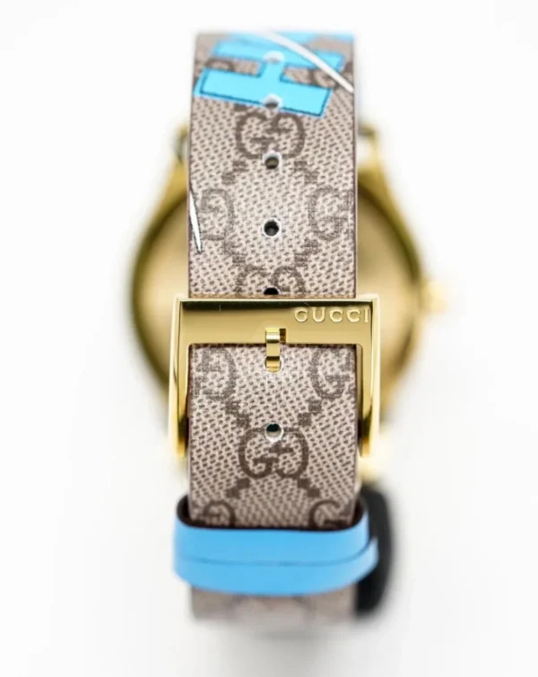 image_2000x_ed5370d1-e889-4465-877a-ea92b09a7c87 Gucci G Timeless Disney Donald Duck Brown Dial Brown Leather Strap Watch For Women - YA1264167
