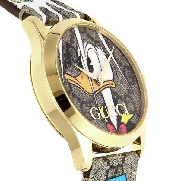 jp_i_n__2_9d5c1b5e-c197-4ef0-9b2e-7adcbb5ab9d3 Gucci G Timeless Disney Donald Duck Brown Dial Brown Leather Strap Watch For Women - YA1264167