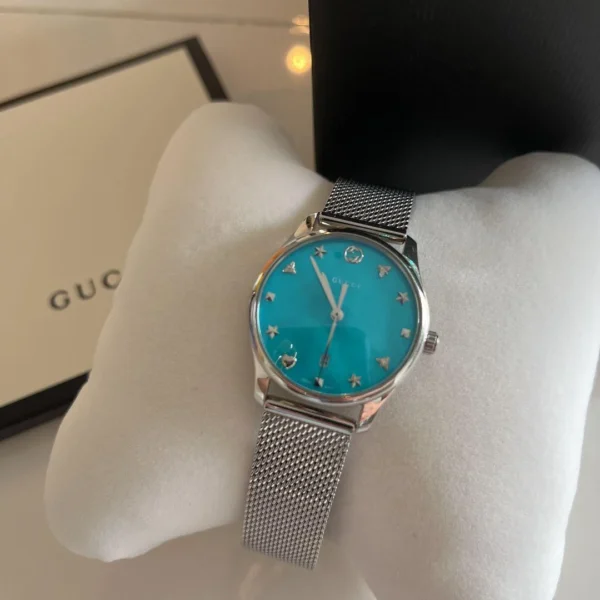 m74443092324_1-403995_89171191-3383-419d-b05d-64433331ce93 Gucci G-Timeless Turquiose Mother of Pearl Dial Silver Mesh Bracelet Watch For Women - YA1264039