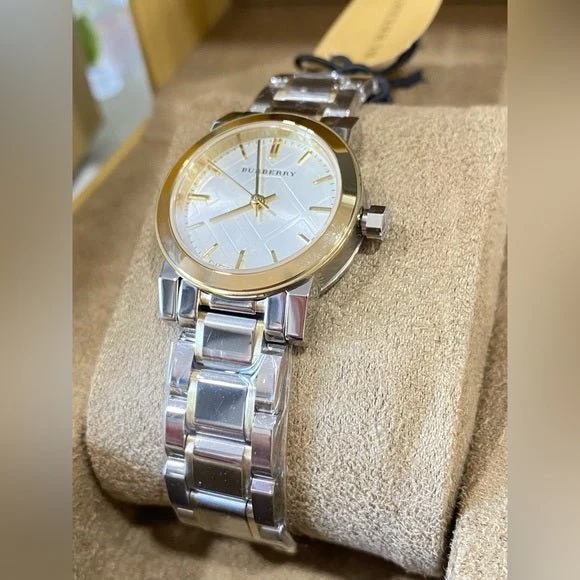 m_636f0a027f29dd28c39825fa-796720_7d35ce59-be6e-4e92-9694-957018b679bb Burberry The City Silver Dial Two Tone Steel Strap Watch for Women - BU9217