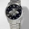 Gucci G Timeless Quartz Black Dial Silver Steel Strap Watch For Women - YA1264136