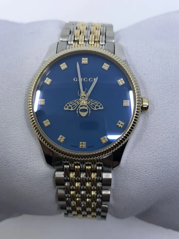 s-l1200_f9bc7bd4-e213-4f78-b571-4ed35153132c Gucci G Timeless Quartz Blue Dial Two Tone Steel Strap Watch For Women - YA1265029