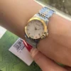 s-l1600_1ec9fffc-d8d3-4856-8689-4e89aaf9820d Gucci G Timeless Diamonds Mother of Pearl Dial Two Tone Mesh Bracelet Watch for Women - YA126513